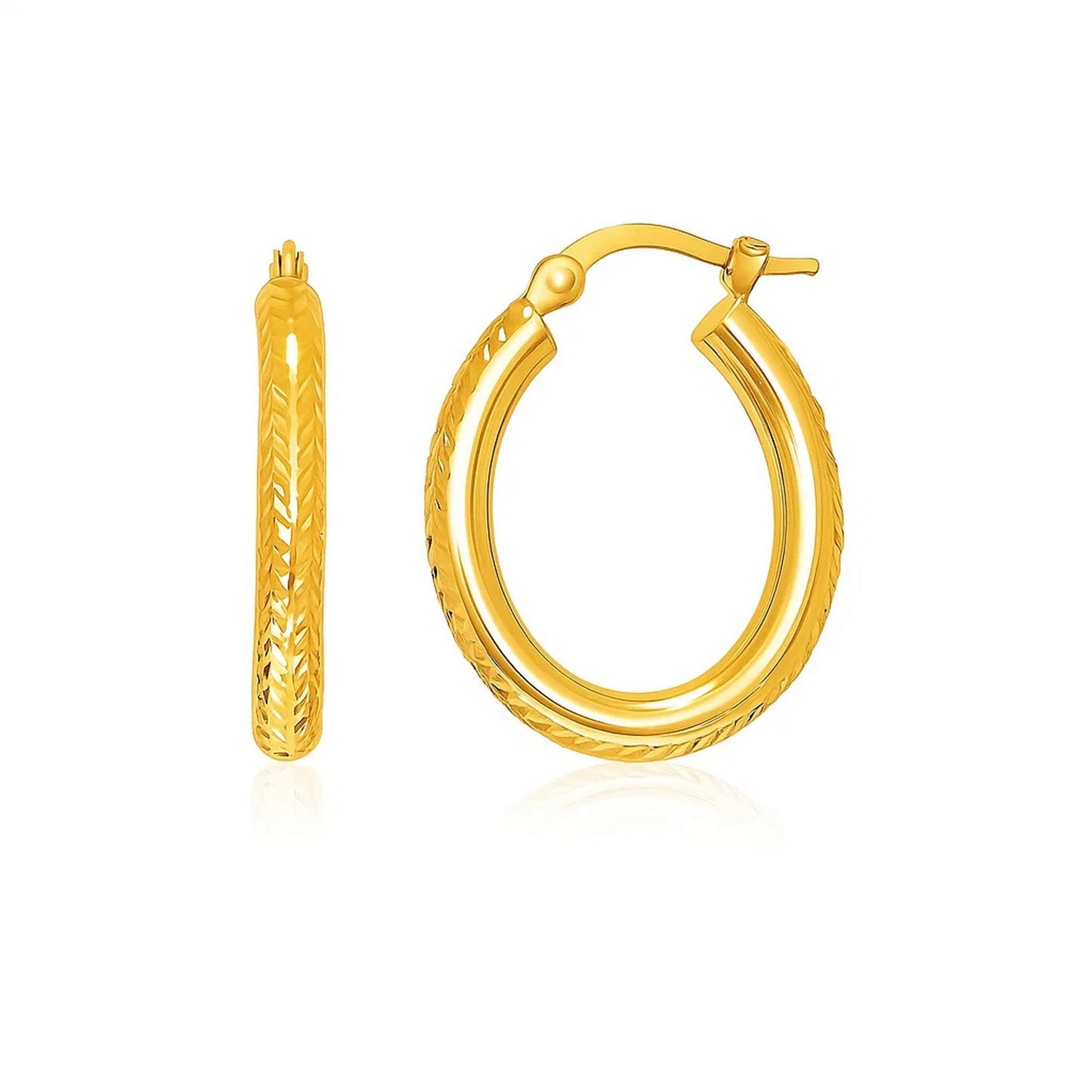 14k Yellow Gold Diamond Cut Textured Oval Hoop Earrings. in a sleek high-contrast midnight luxury editorial style