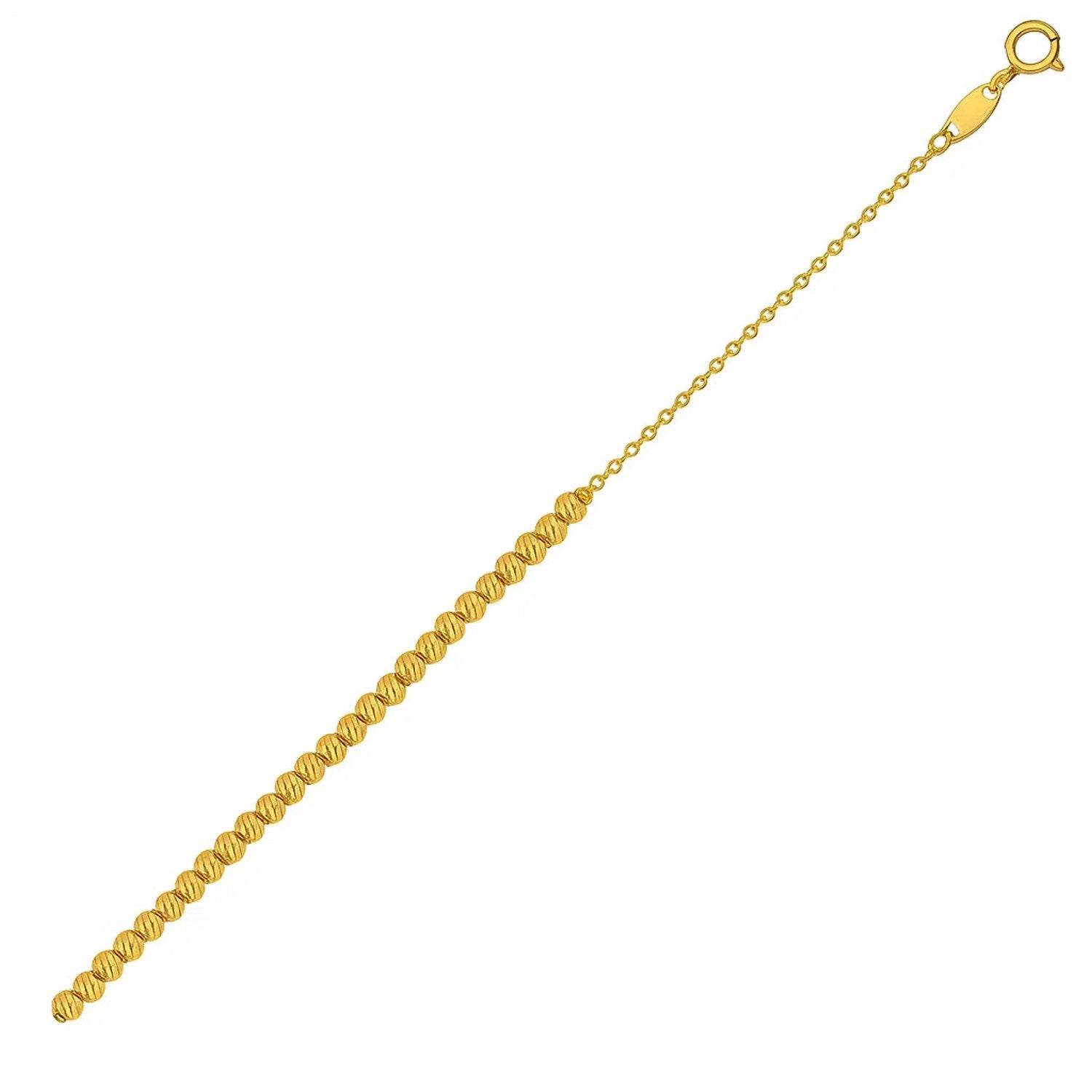 Diamond Cut Bead Bracelet in 14K Yellow Gold in a sleek high-contrast midnight luxury editorial style