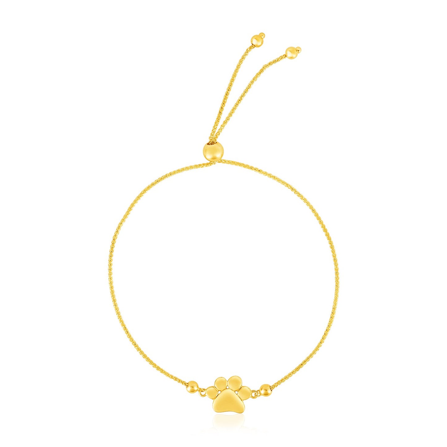 14k Yellow Gold Adjustable Paw Print Bracelet (1.10 mm) in a sleek high-contrast midnight luxury editorial style