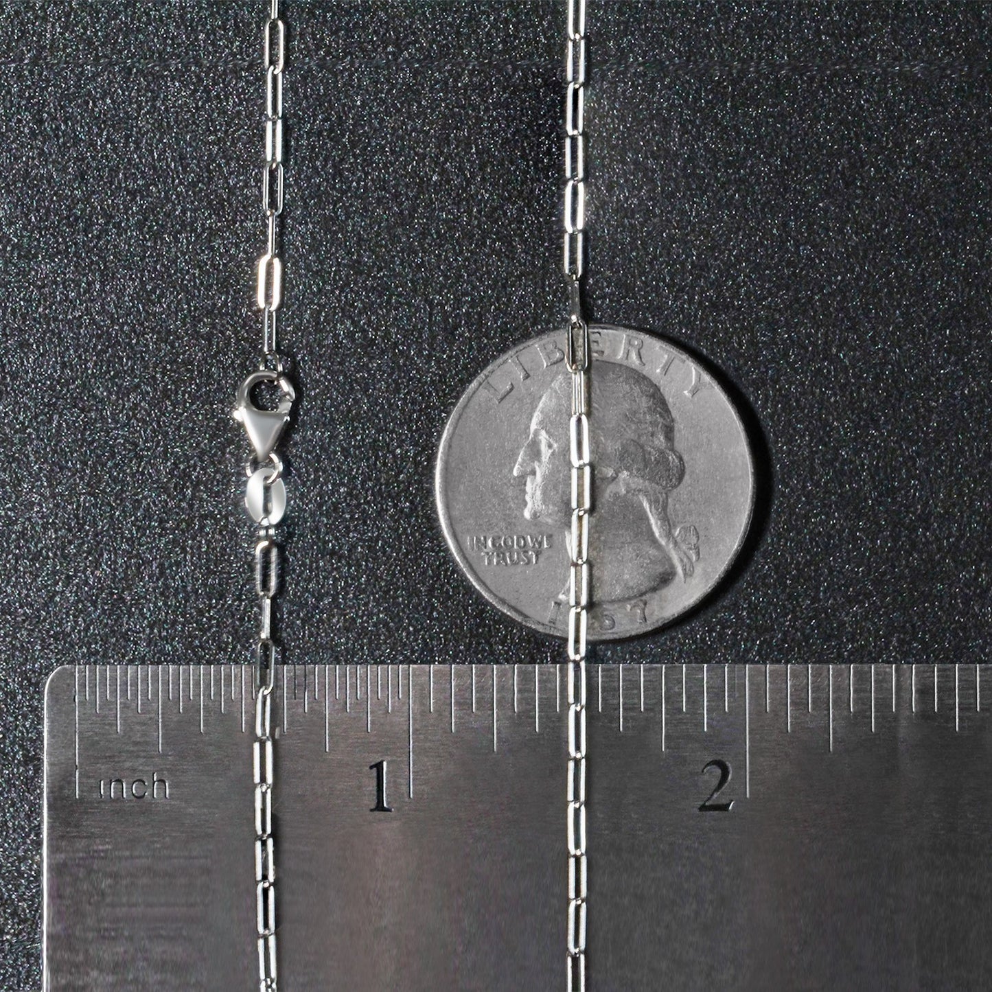 Peelerie jewelry piece in midnight luxury editorial product photo, high-contrast studio lighting