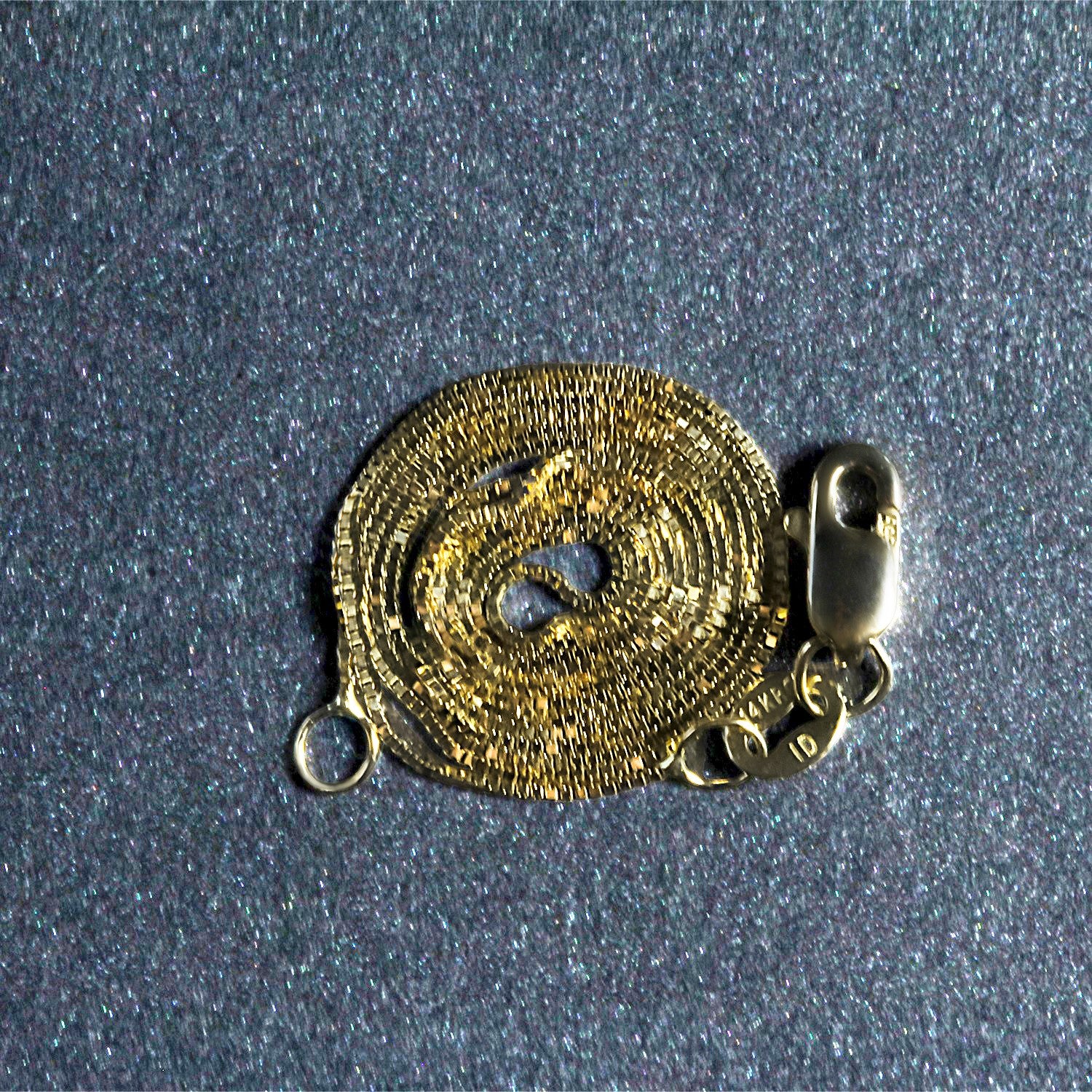 Peelerie jewelry piece in midnight luxury editorial product photo, high-contrast studio lighting