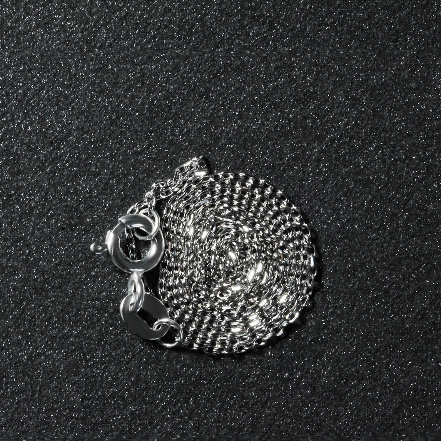 Peelerie jewelry piece in midnight luxury editorial product photo, high-contrast studio lighting