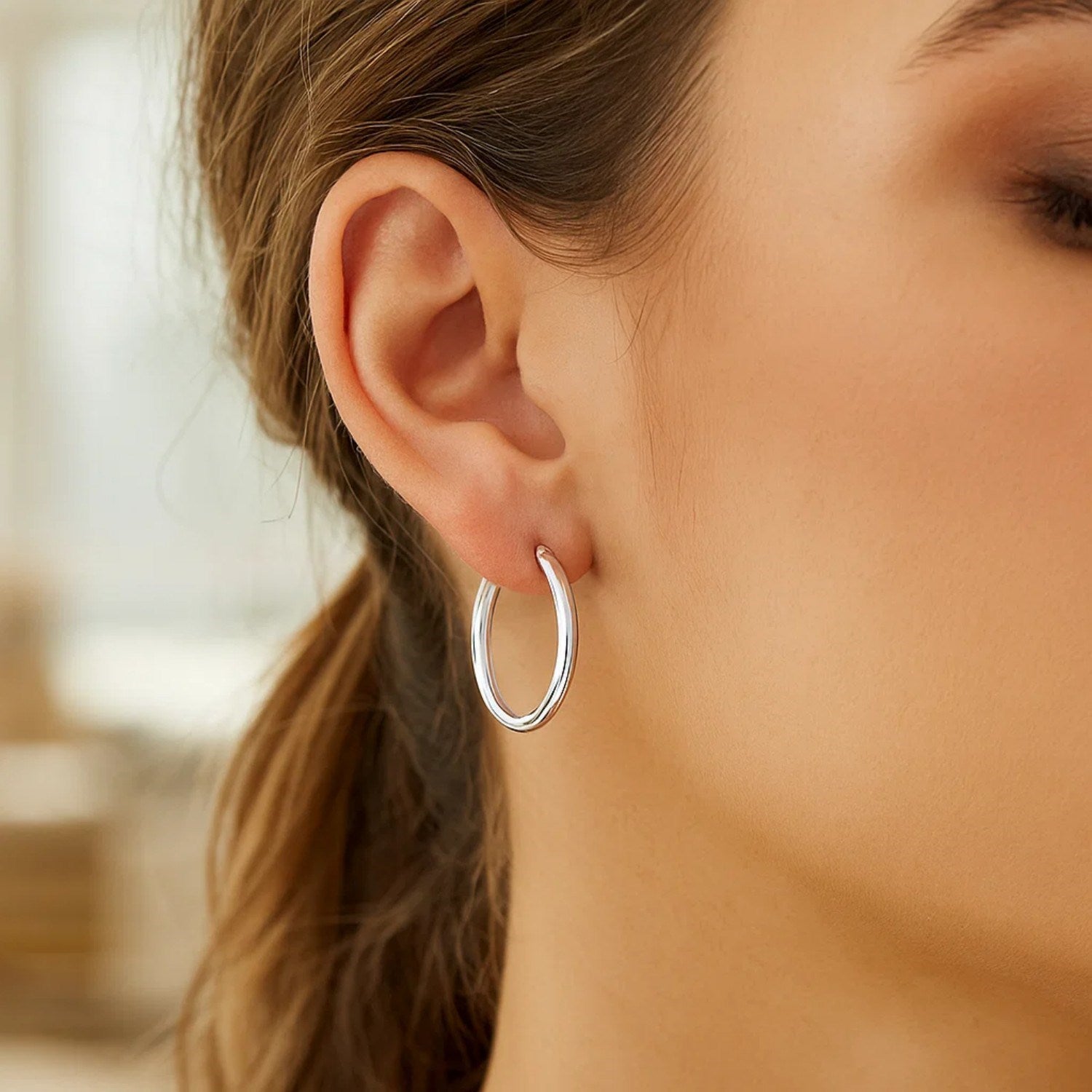 Peelerie jewelry piece in midnight luxury editorial product photo, high-contrast studio lighting