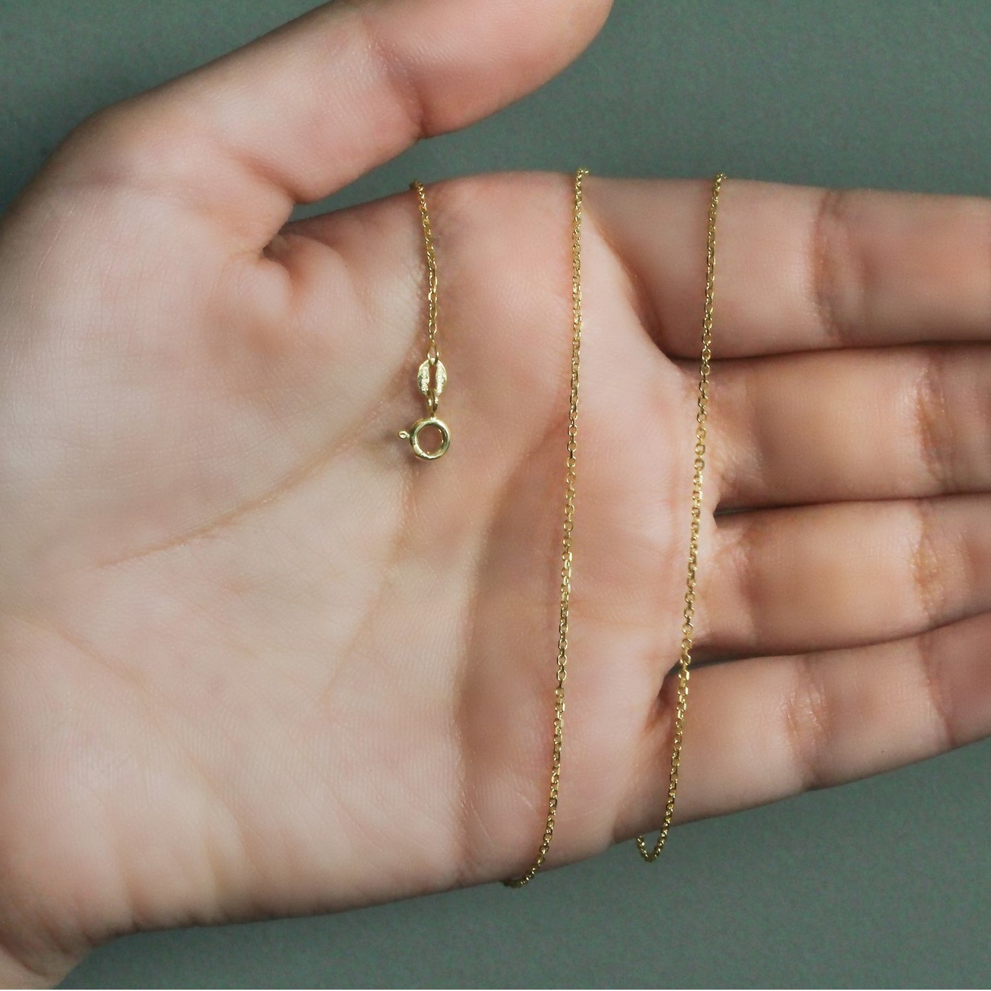 Peelerie jewelry piece in midnight luxury editorial product photo, high-contrast studio lighting