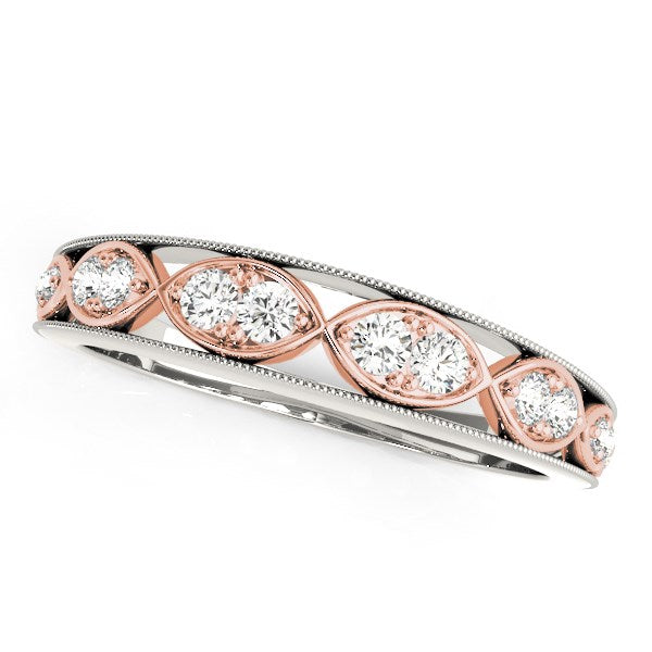 14k White And Rose Gold Infinity Style Diamond Band (1/5 cttw) in a sleek high-contrast midnight luxury editorial style