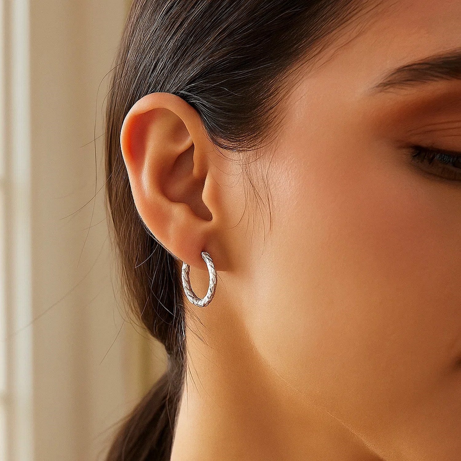 Peelerie jewelry piece in midnight luxury editorial product photo, high-contrast studio lighting