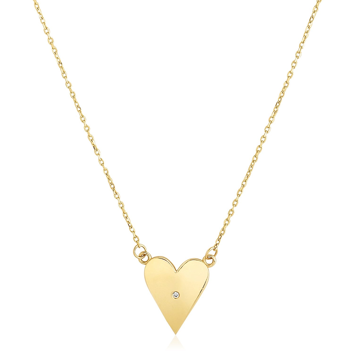 14k Yellow Gold High Polish Elongated Heart Necklace in a sleek high-contrast midnight luxury editorial style