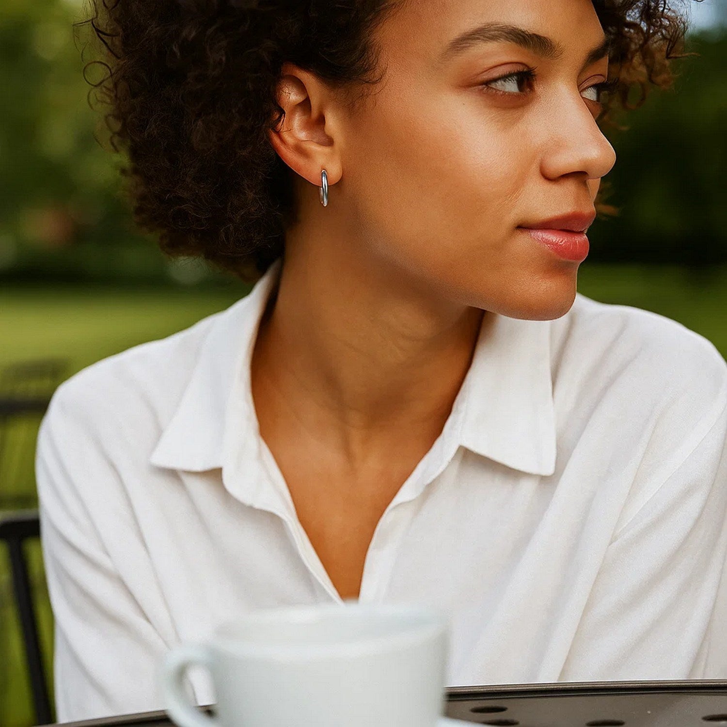 Peelerie jewelry piece in midnight luxury editorial product photo, high-contrast studio lighting