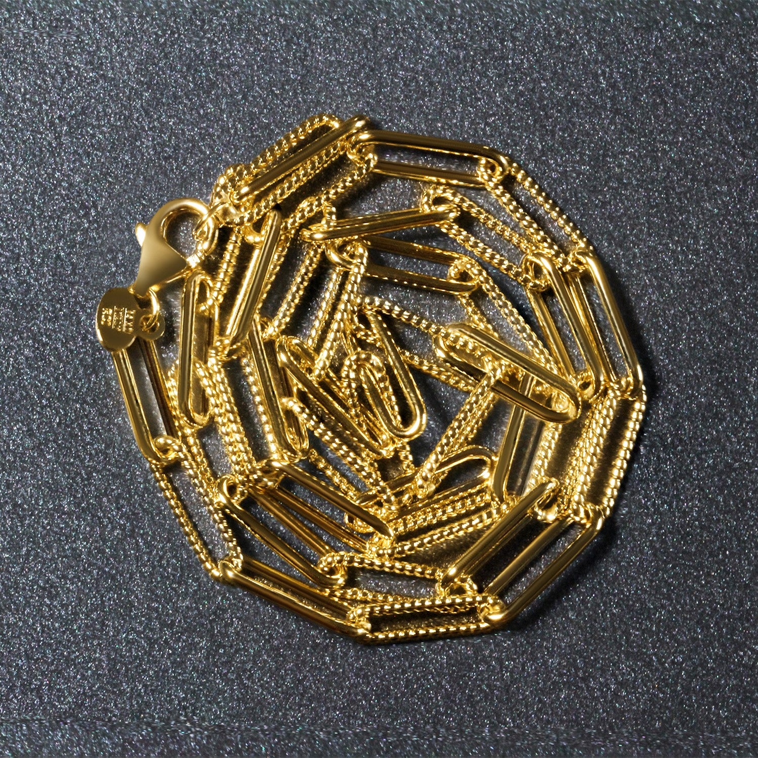 Peelerie jewelry piece in midnight luxury editorial product photo, high-contrast studio lighting