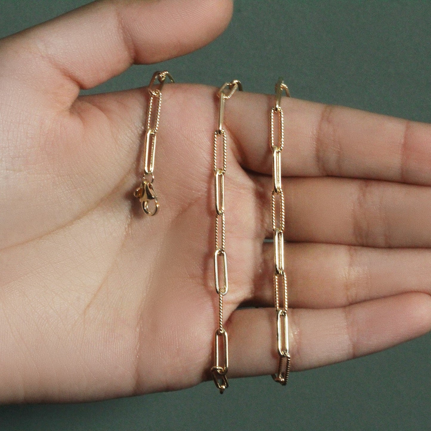 Peelerie jewelry piece in midnight luxury editorial product photo, high-contrast studio lighting