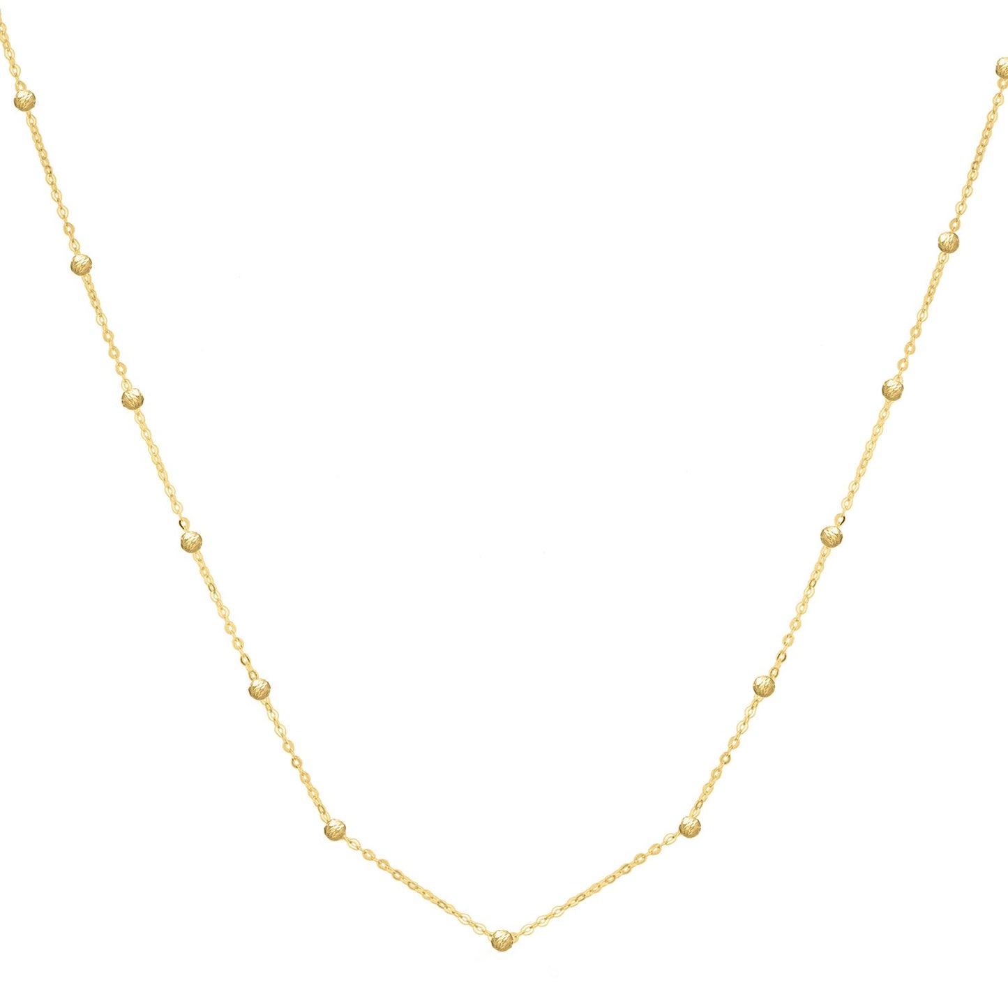 Textured Saturn Bead Necklace in 14K Yellow Gold in a sleek high-contrast midnight luxury editorial style
