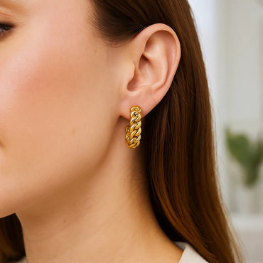 Peelerie jewelry piece in midnight luxury editorial product photo, high-contrast studio lighting