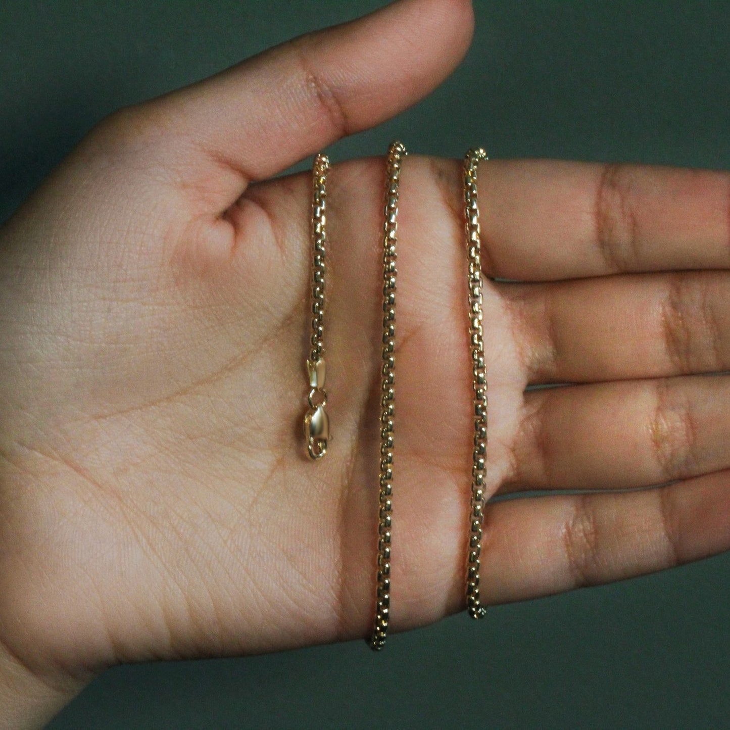 Peelerie jewelry piece in midnight luxury editorial product photo, high-contrast studio lighting