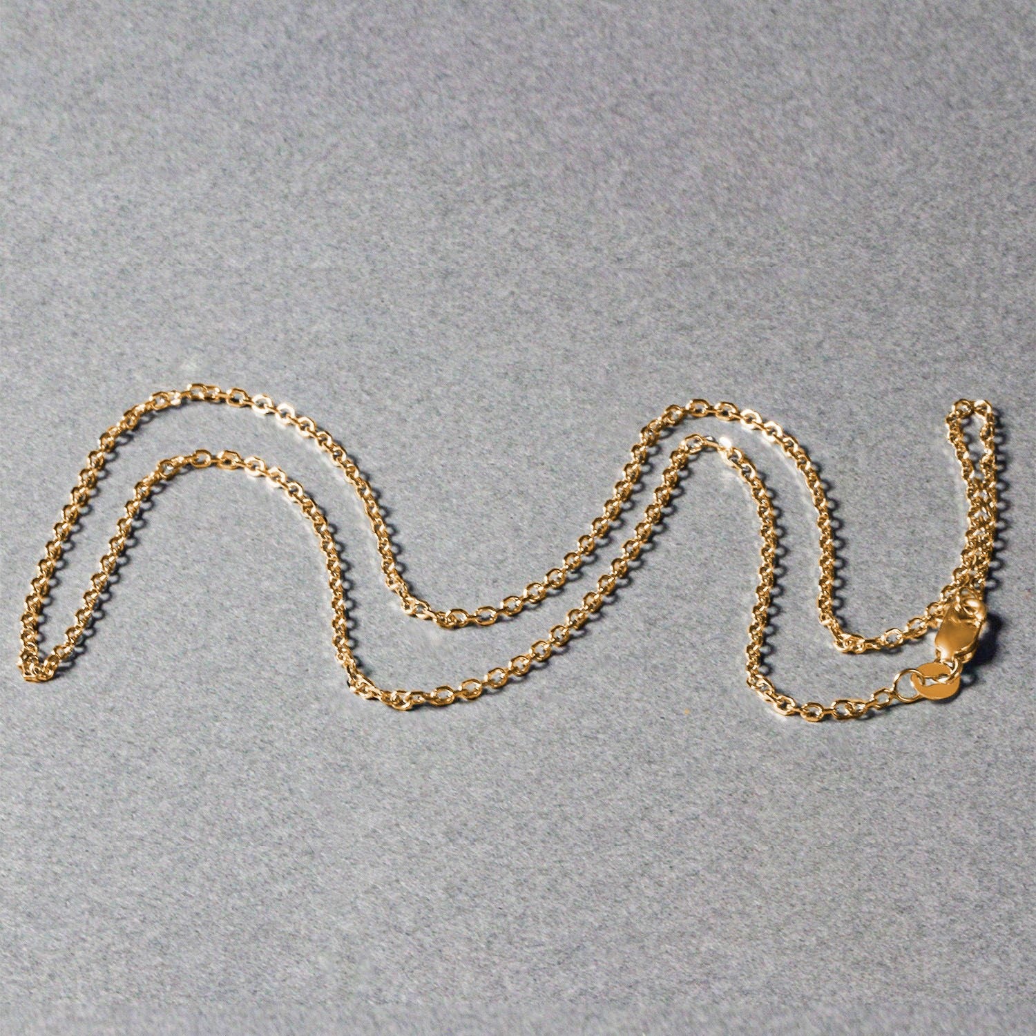 Peelerie jewelry piece in midnight luxury editorial product photo, high-contrast studio lighting