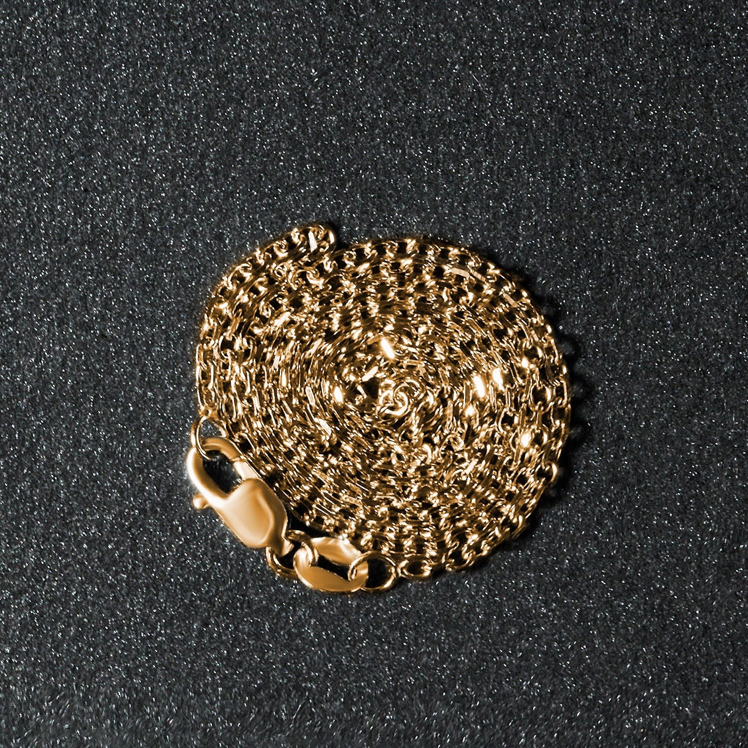 Peelerie jewelry piece in midnight luxury editorial product photo, high-contrast studio lighting