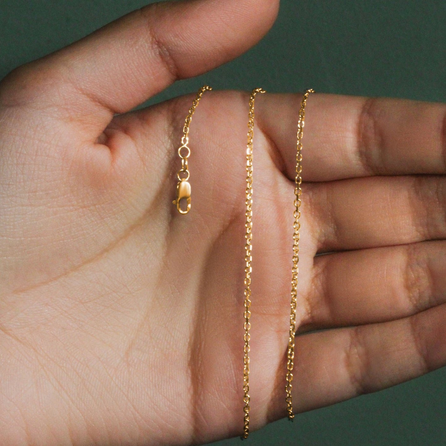 Peelerie jewelry piece in midnight luxury editorial product photo, high-contrast studio lighting