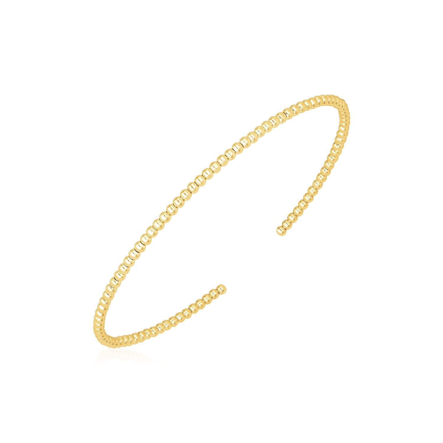 14k Yellow Gold High Polish Bead Cuff Bangle (2.00 mm) in a sleek high-contrast midnight luxury editorial style