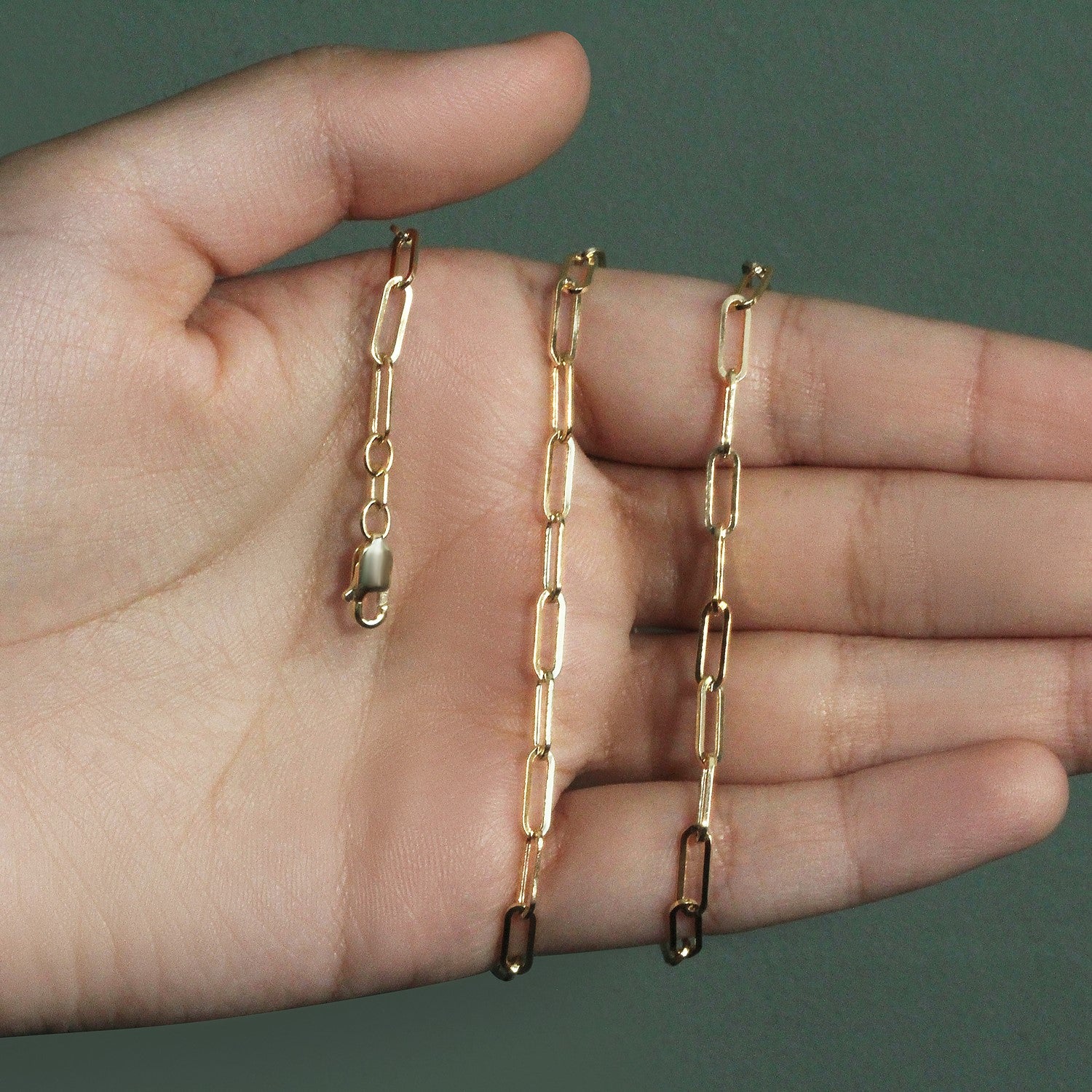 Peelerie jewelry piece in midnight luxury editorial product photo, high-contrast studio lighting