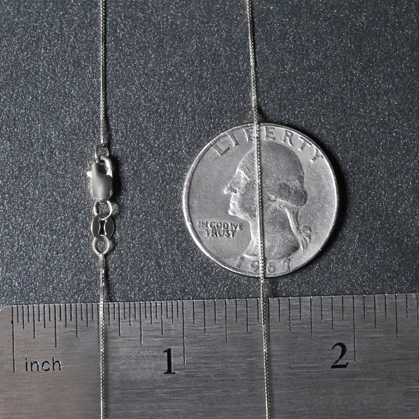 Peelerie jewelry piece in midnight luxury editorial product photo, high-contrast studio lighting