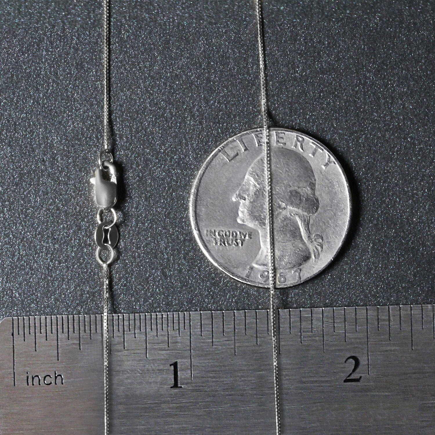 Peelerie jewelry piece in midnight luxury editorial product photo, high-contrast studio lighting