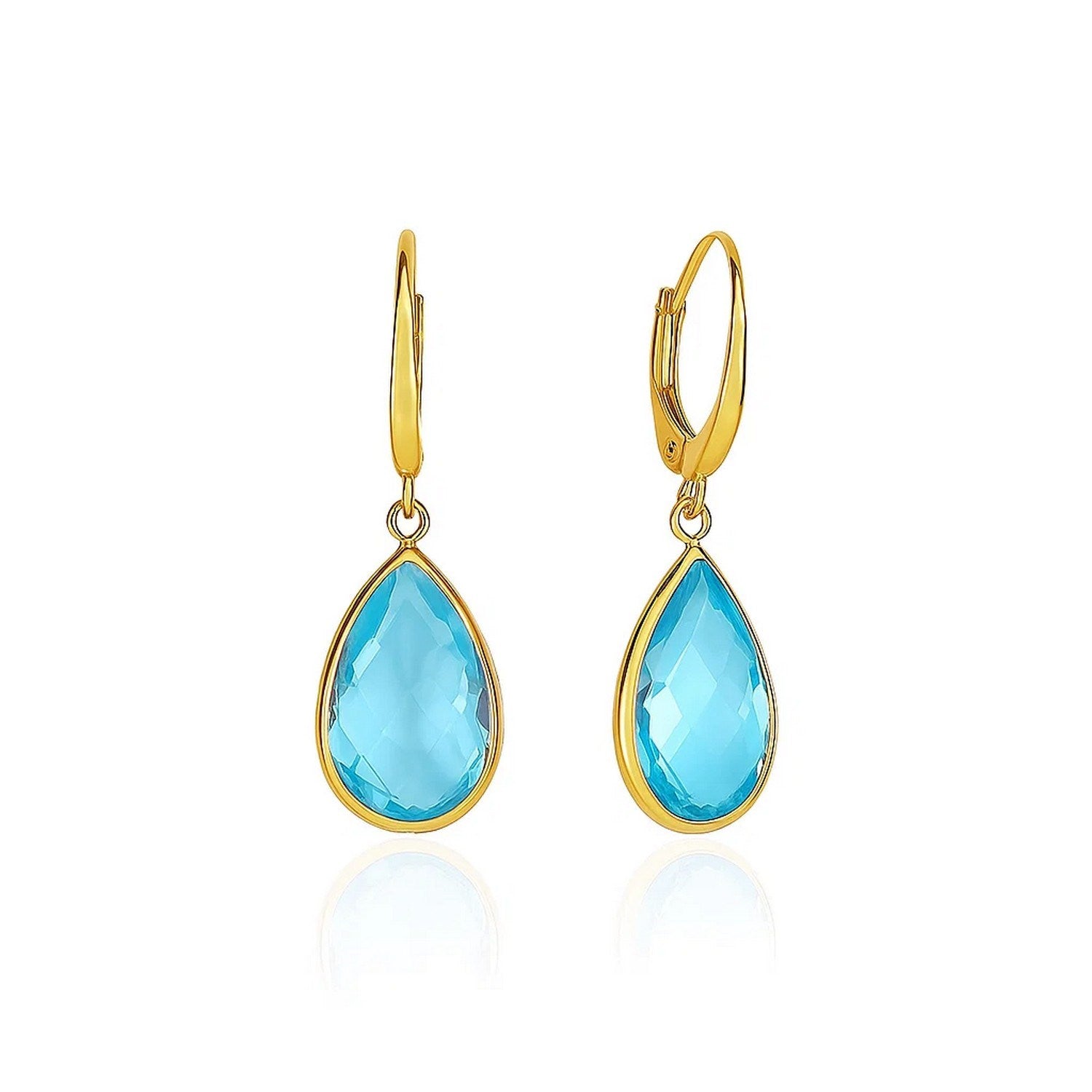 Drop Earrings with Pear-Shaped Blue Topaz Briolettes in 14k Yellow Gold in a sleek high-contrast midnight luxury editorial st