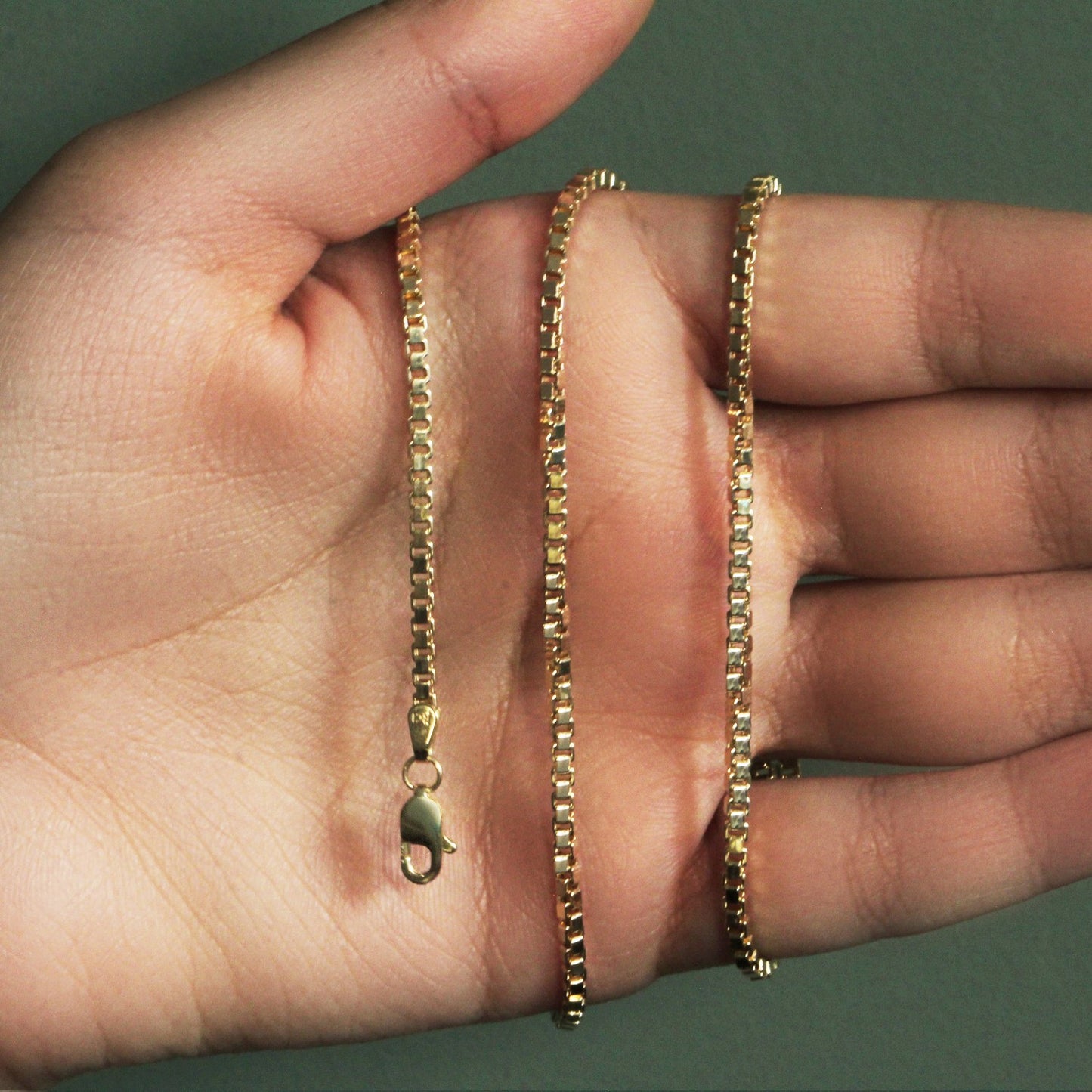 Peelerie jewelry piece in midnight luxury editorial product photo, high-contrast studio lighting