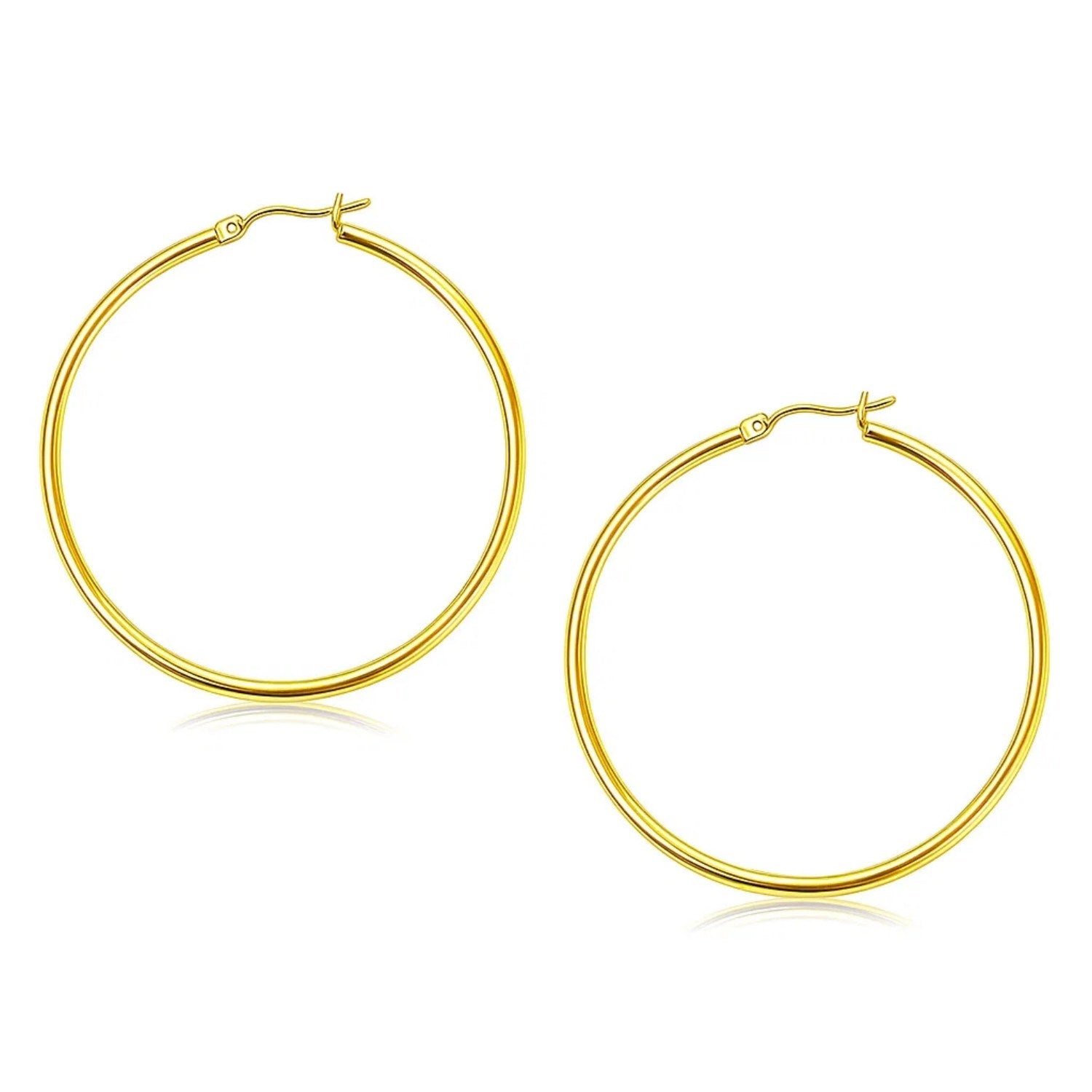 10k Yellow Gold Polished Hoop Earrings (2x45mm) in a sleek high-contrast midnight luxury editorial style