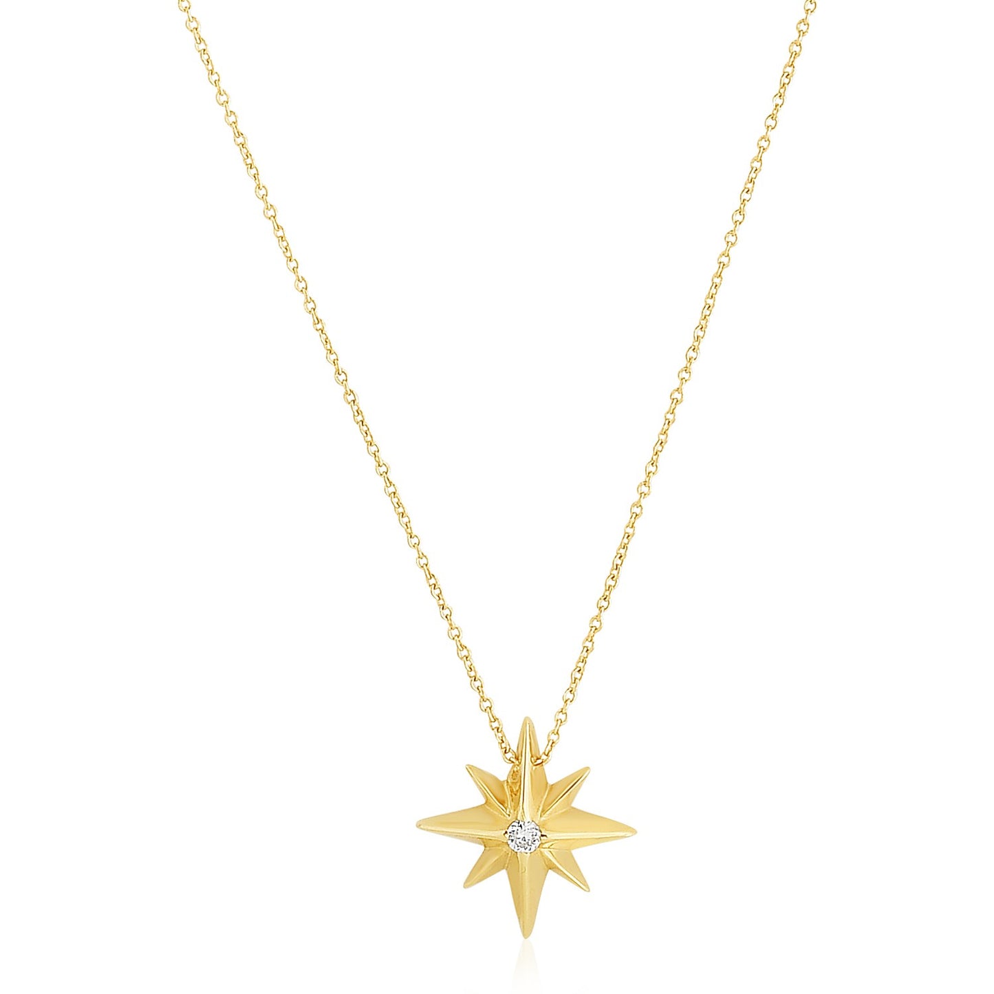 14k Yellow Gold High Polish North Star Necklace in a sleek high-contrast midnight luxury editorial style