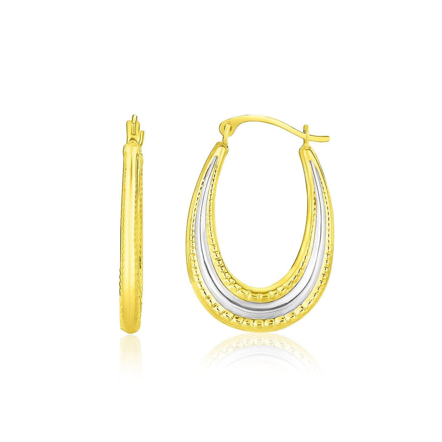 10k Two-Tone Gold Graduated Textured Oval Hoop Earrings in a sleek high-contrast midnight luxury editorial style