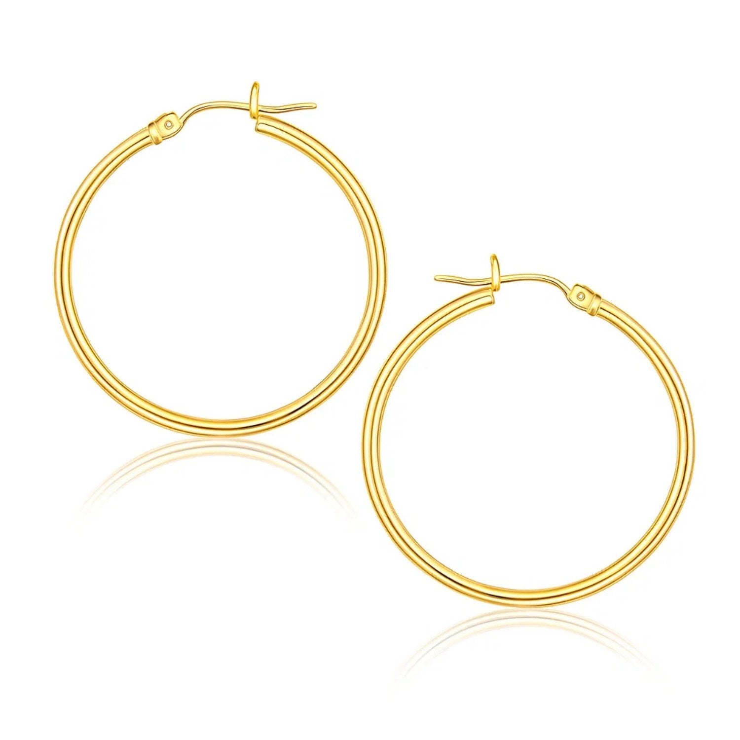 10k Yellow Gold Polished Hoop Earrings (1.5x25mm) in a sleek high-contrast midnight luxury editorial style