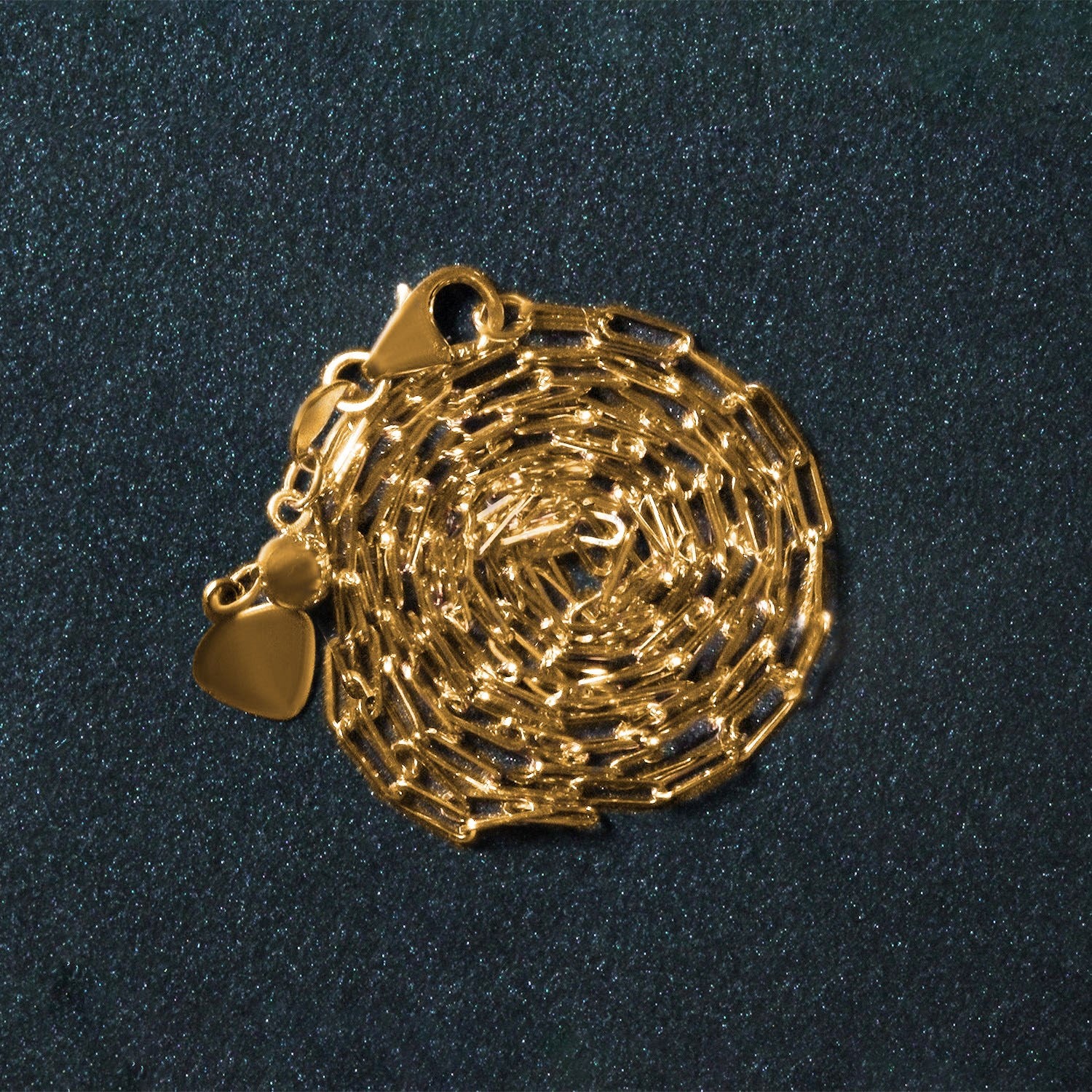 Peelerie jewelry piece in midnight luxury editorial product photo, high-contrast studio lighting