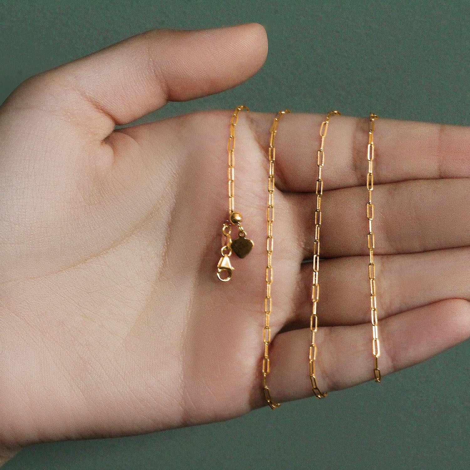 Peelerie jewelry piece in midnight luxury editorial product photo, high-contrast studio lighting