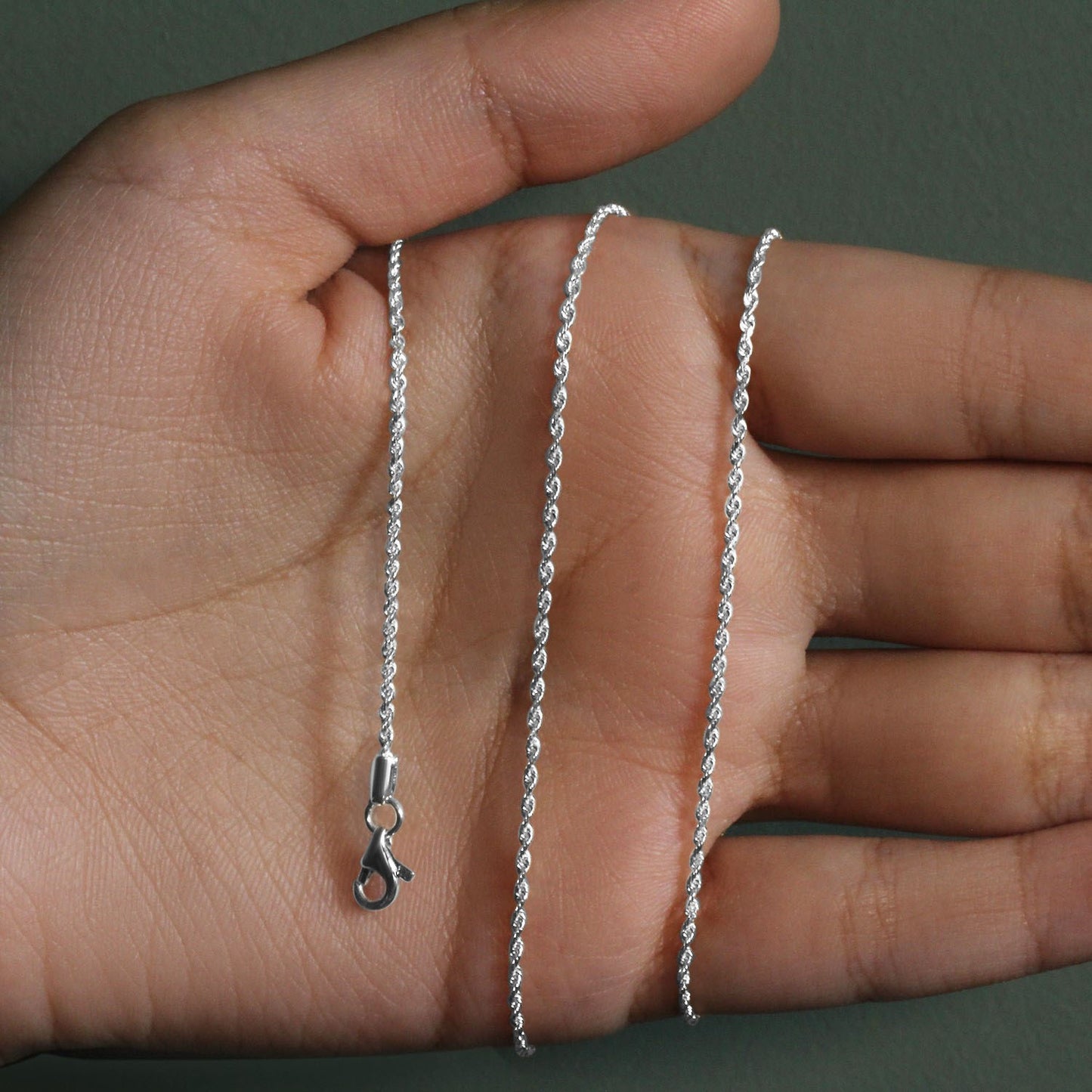 Peelerie jewelry piece in midnight luxury editorial product photo, high-contrast studio lighting