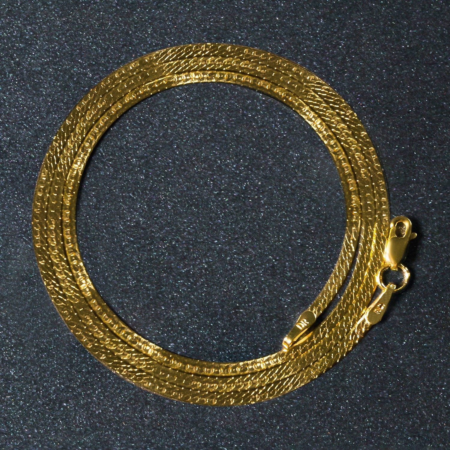 Peelerie jewelry piece in midnight luxury editorial product photo, high-contrast studio lighting