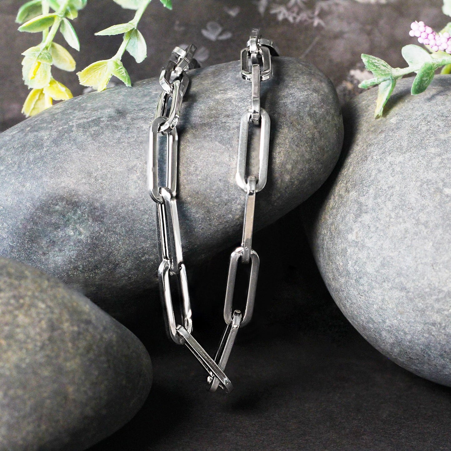 Peelerie jewelry piece in midnight luxury editorial product photo, high-contrast studio lighting