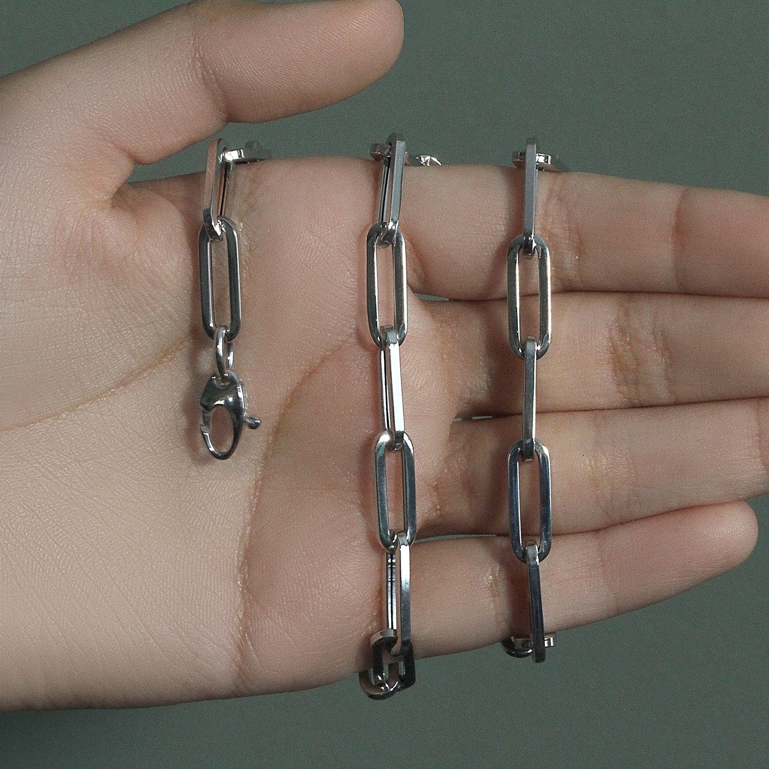 Peelerie jewelry piece in midnight luxury editorial product photo, high-contrast studio lighting