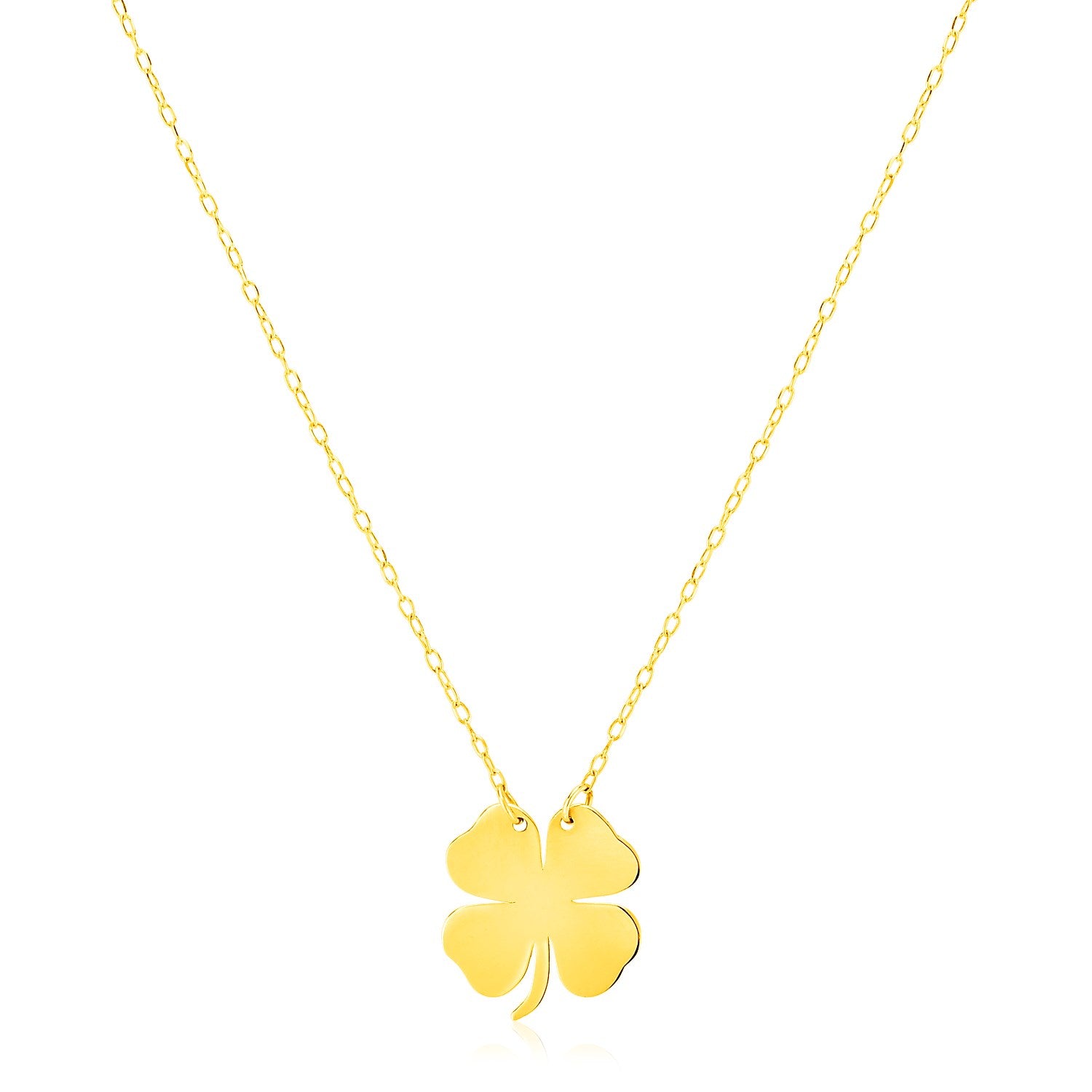 14K Yellow Gold Four Leaf Clover Necklace in a sleek high-contrast midnight luxury editorial style