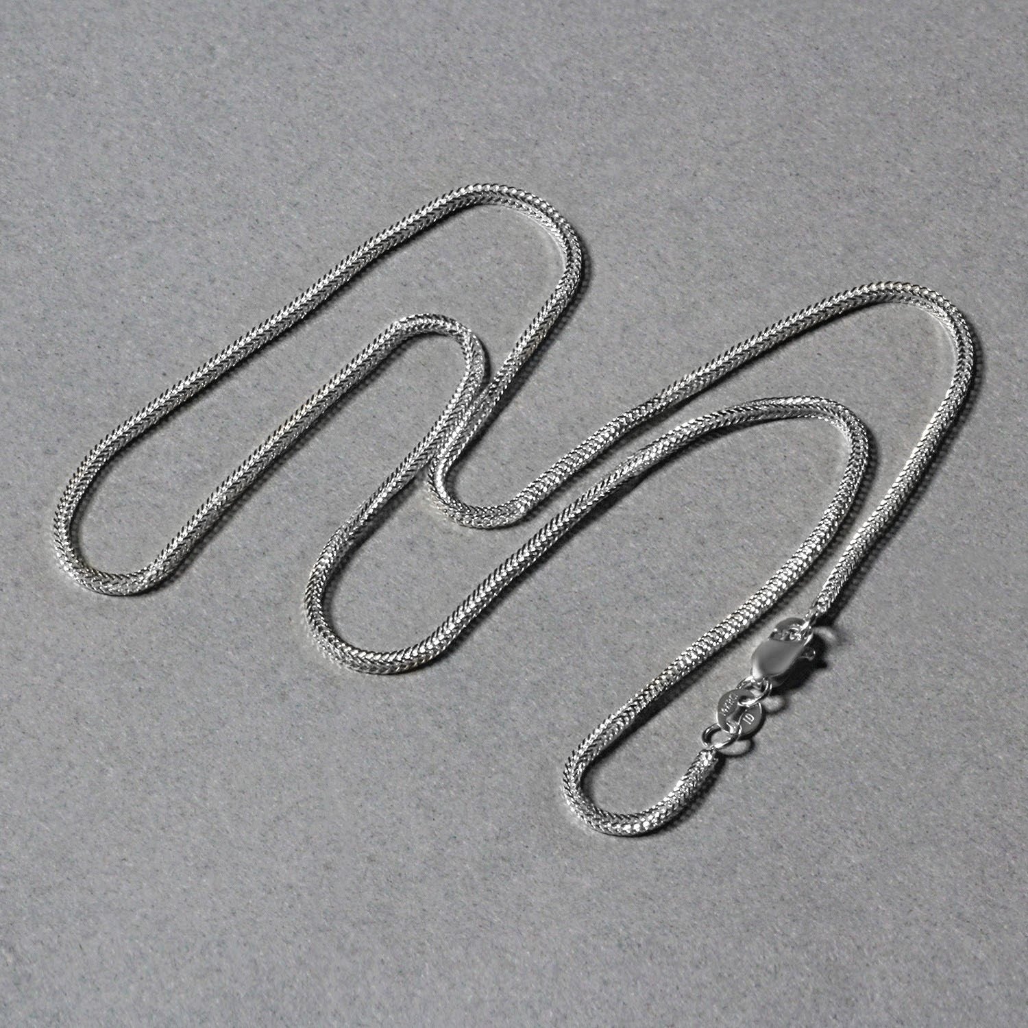 Peelerie jewelry piece in midnight luxury editorial product photo, high-contrast studio lighting