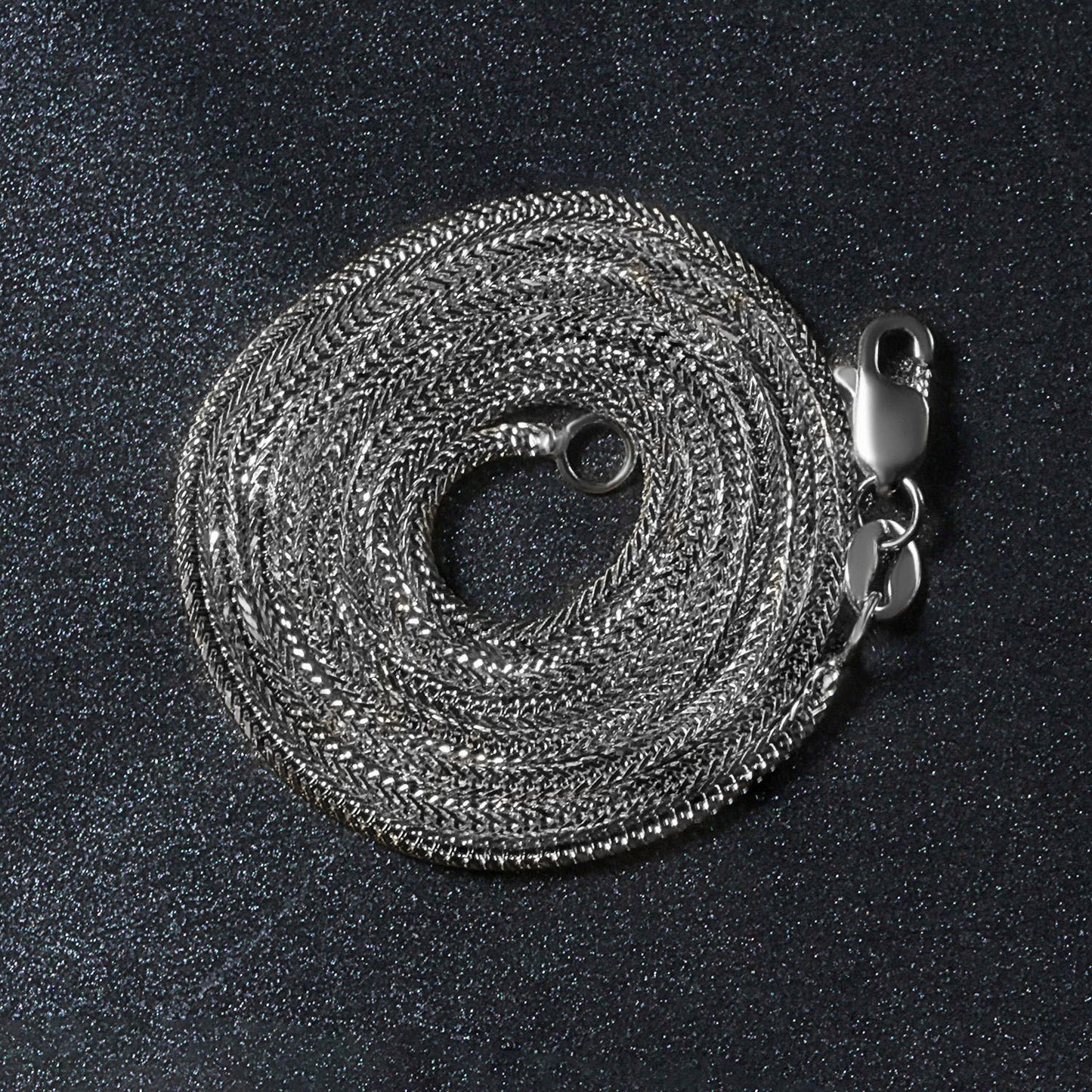 Peelerie jewelry piece in midnight luxury editorial product photo, high-contrast studio lighting