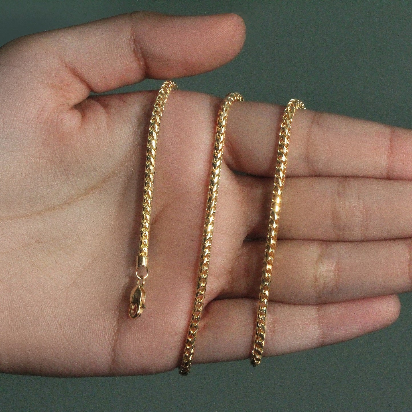 Peelerie jewelry piece in midnight luxury editorial product photo, high-contrast studio lighting