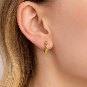 Peelerie jewelry piece in midnight luxury editorial product photo, high-contrast studio lighting