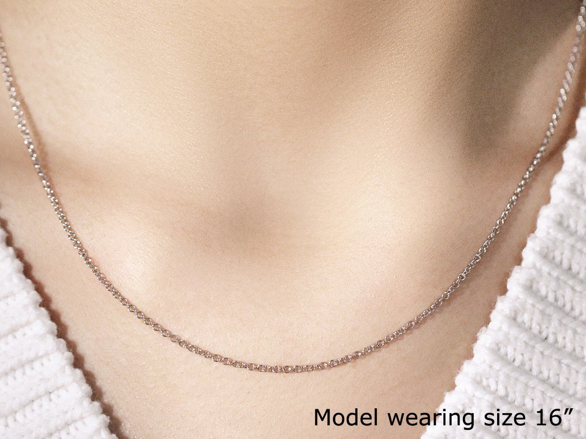 Peelerie jewelry piece in gold midnight luxury editorial product photo, high-contrast studio lighting