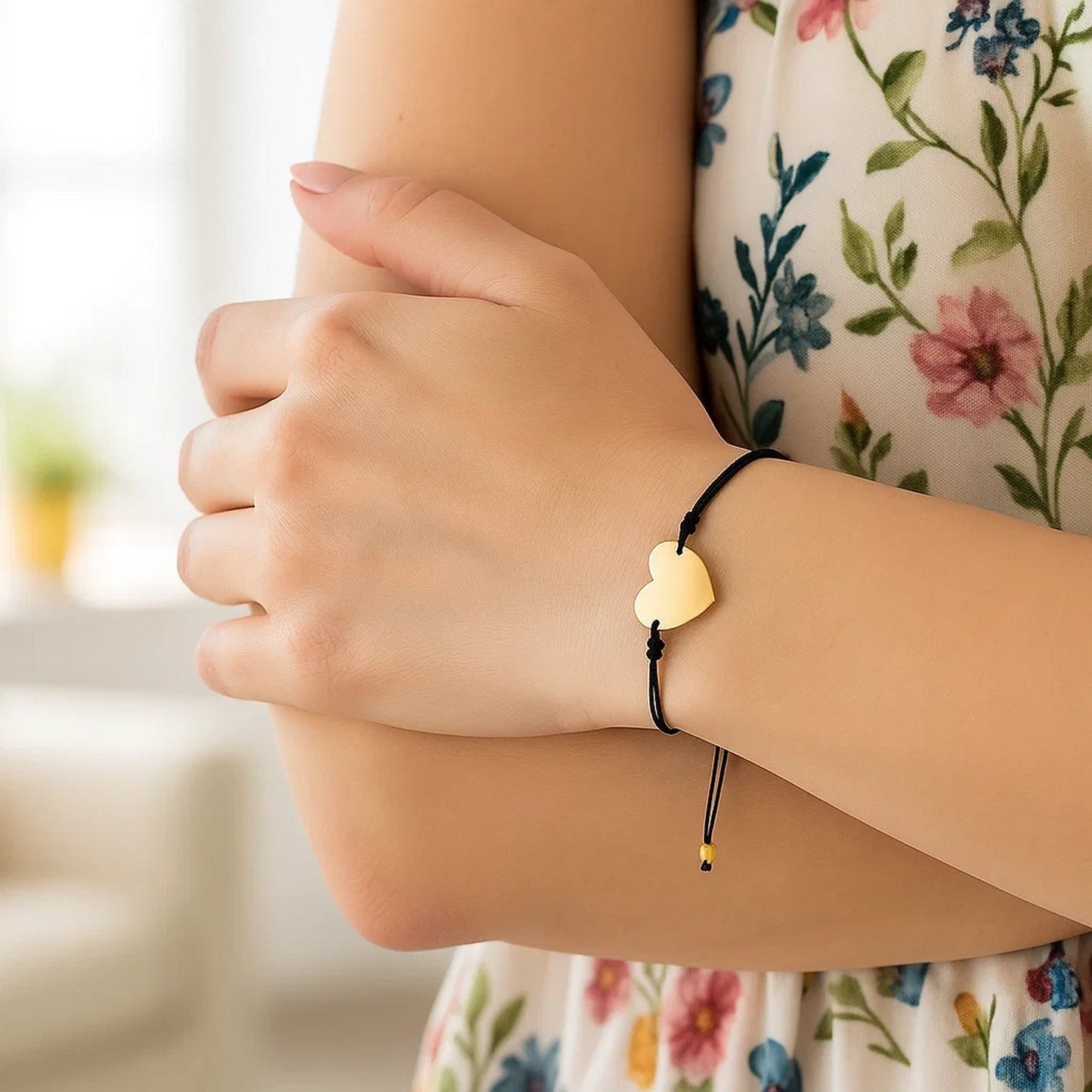 9 1/4 inch Black Cord Adjustable Bracelet with 14k yellow Gold Heart
