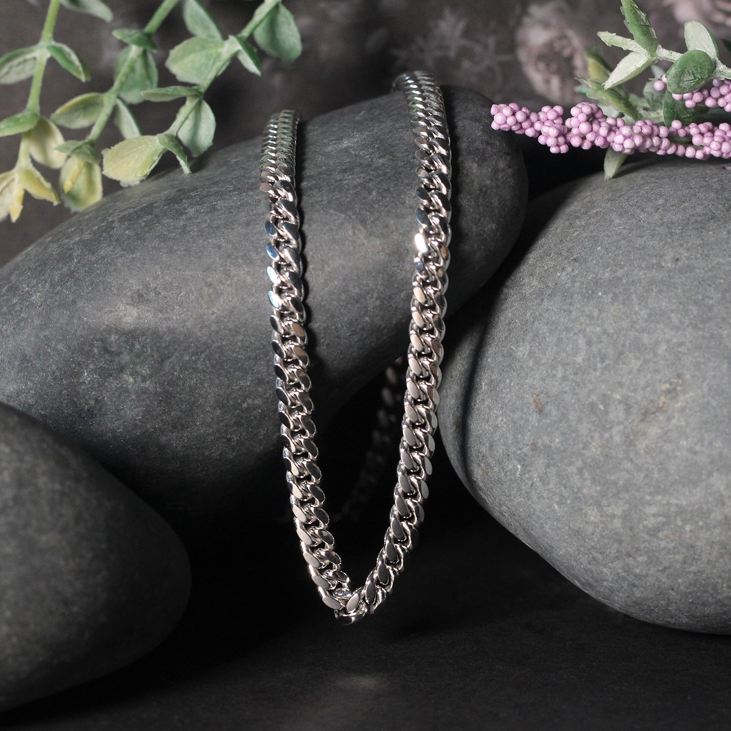 Peelerie jewelry piece in midnight luxury editorial product photo, high-contrast studio lighting