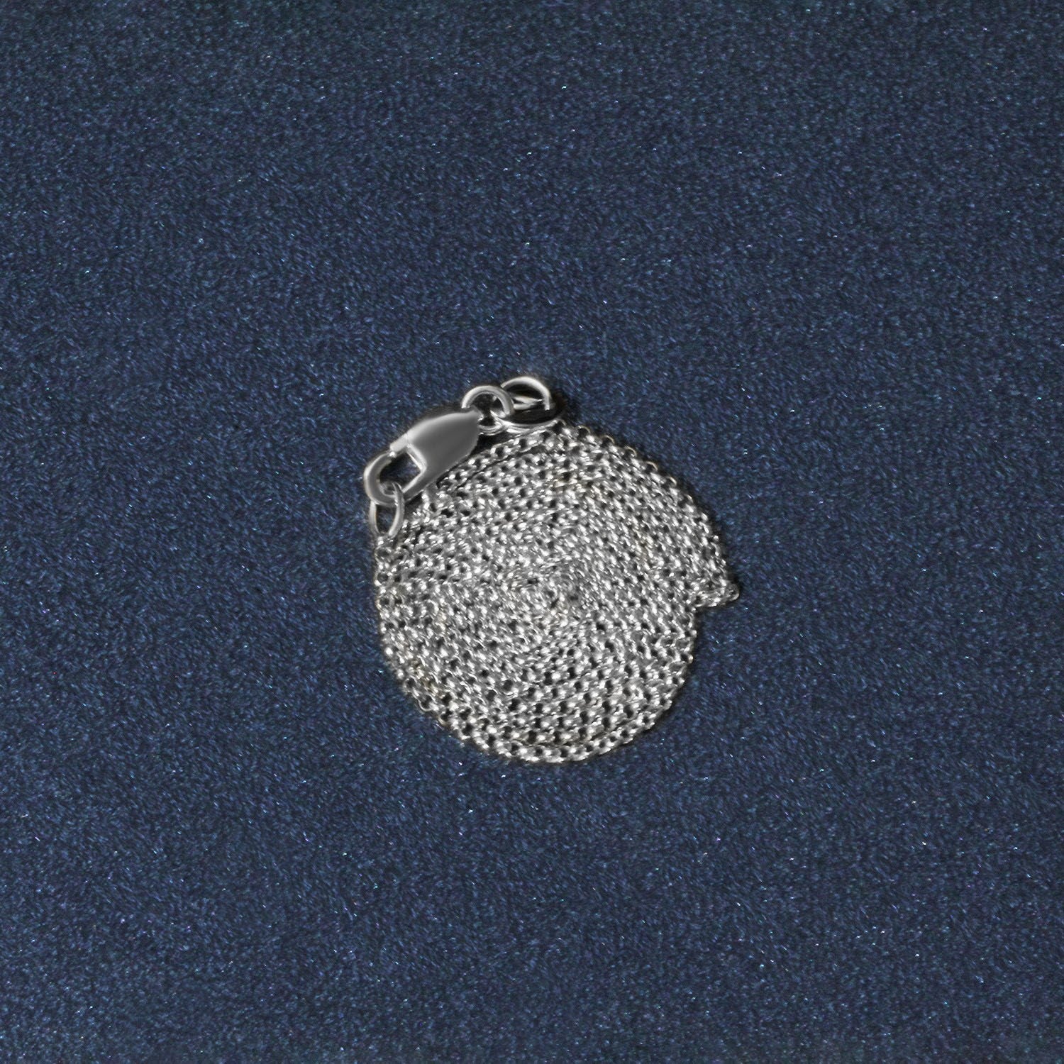 Peelerie jewelry piece in midnight luxury editorial product photo, high-contrast studio lighting