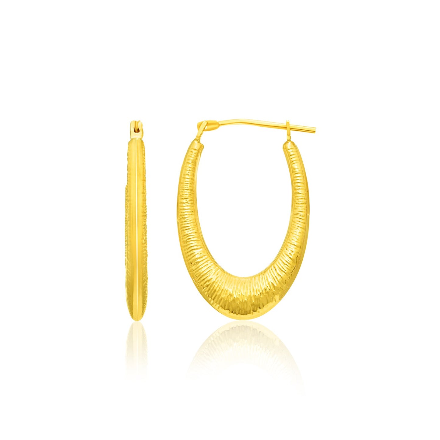 14k Yellow Gold Hoop Earrings in a Graduated Texture Style in a sleek high-contrast midnight luxury editorial style
