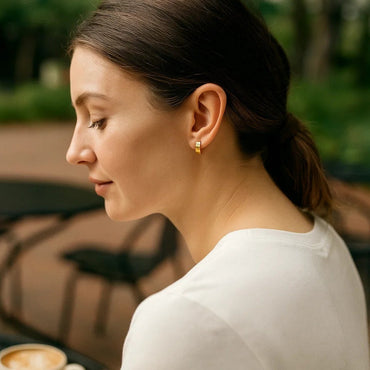 Peelerie jewelry piece in midnight luxury editorial product photo, high-contrast studio lighting