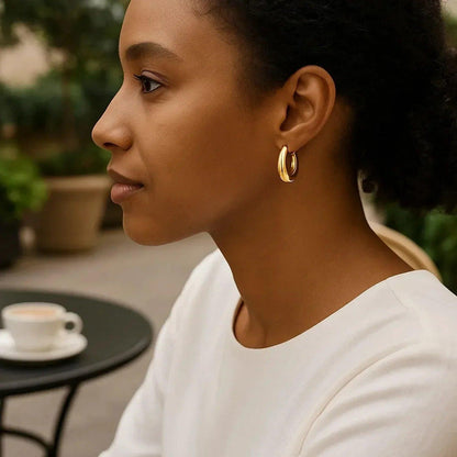 Medium Tapered Hoop Earrings in 14K Yellow Gold - Peelerie