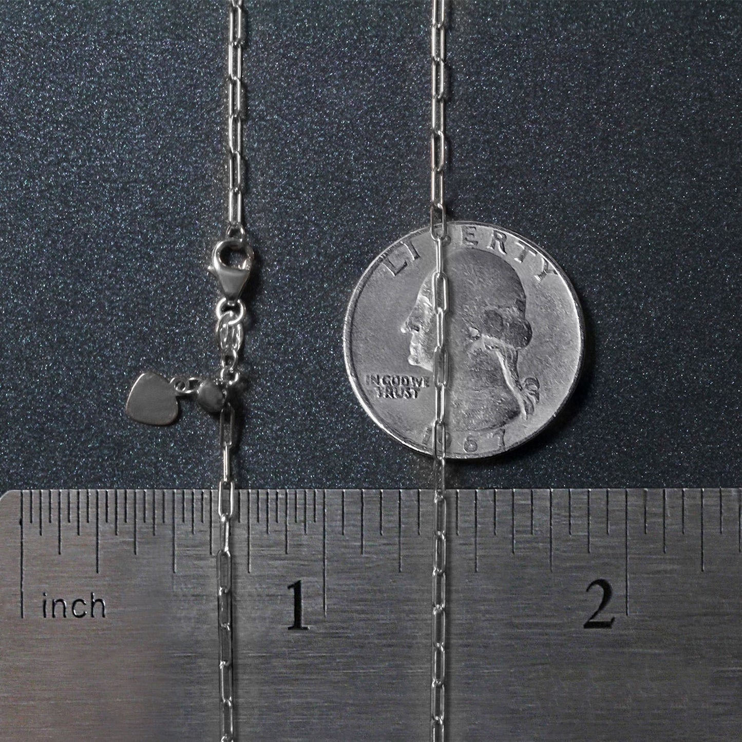 Peelerie jewelry piece in midnight luxury editorial product photo, high-contrast studio lighting