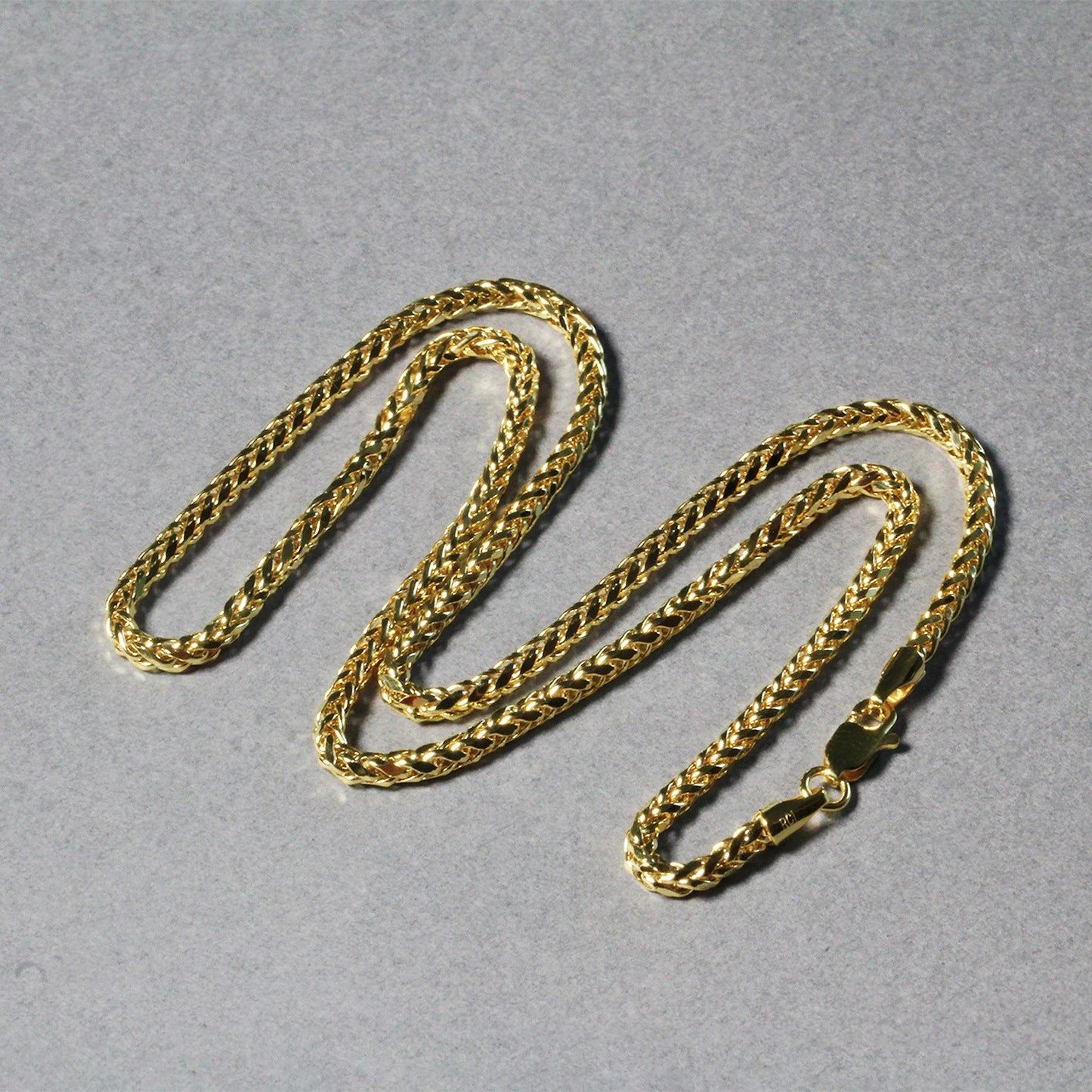 Peelerie jewelry piece in midnight luxury editorial product photo, high-contrast studio lighting